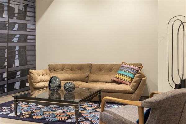 Sådan kan du gennemføre en tæppestil i dit hjem